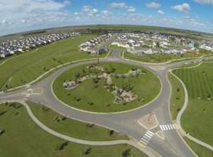 Roundabouts eliminate the left-hand turn – and the T-bones that go along with them. Roundabouts also force drivers to slow down, leaving them – and pedestrians! – with more time to react and make a decision. Pictured: Eagle Run Roundabout